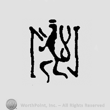 Double-tailed animal over capital N