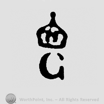 Uppercase G with crown above