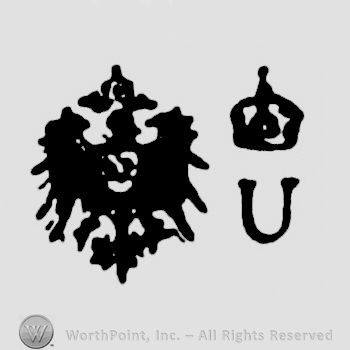 Eagle with shield, uppercase U with crown