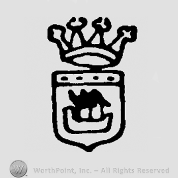 Shield with castle on it and crown above