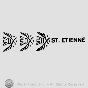 Crossed branches with crown appearing three times and St. Etienne written with uppercase letters