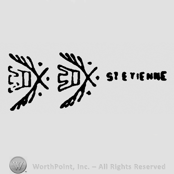 Crossed branches with crown appearing twice and St. Etienne written with uppercase letters