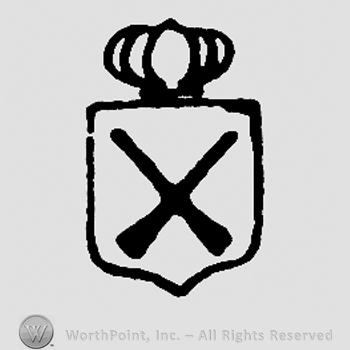 Crossed guns on a shield with crown above