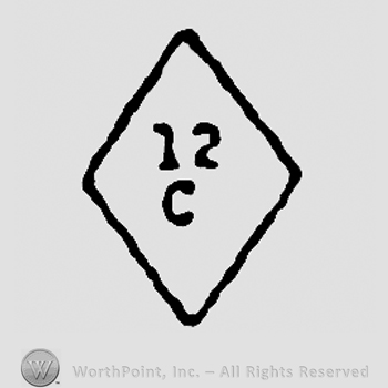 Number 12 and uppercase C in a diamond