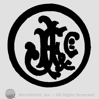 Monogram in circle.