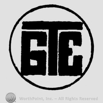 Monogram in circle.