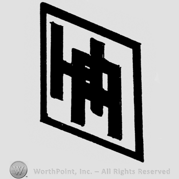 Diamond with monogram.