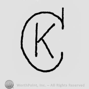 Letter C enclosing letter K.