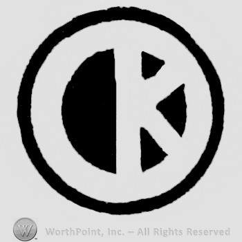 Letter K in circle.