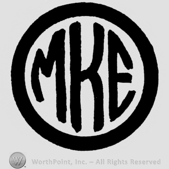 Initials M,K,E in circle.