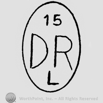 Letters D, R in oval.