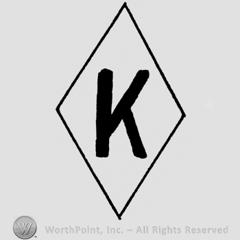 Letter K in diamond.