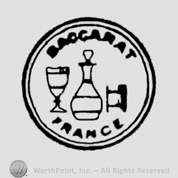 Round design with "Baccarat France" written in uppercase letters