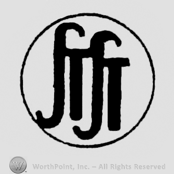 Uppercase handwritten "ST" written twice inside a circle