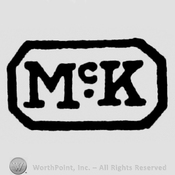 "McK" with uppercase letters inside a rectangle