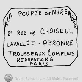 A la Poupee de Nurember, 21 Rue de Choiseul Lavallee-Peronne Trousseazu Complets Reparations Paris written with uppercase letters inside a rectangular shaped design