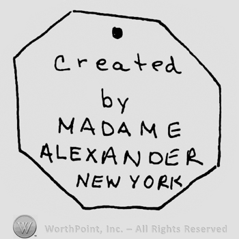 Created by Madame Alexander New York written with lowercase then uppercase letters inside an octogon