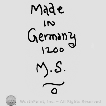 Made in Germany written with lowercase letters over numer 1200, uppercase M.S. and waved line over a small circle