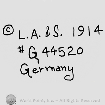 The Copyright sign, capital L.A.&S., year 1914, capital G and number 44520, Germany written below with lowercase letters