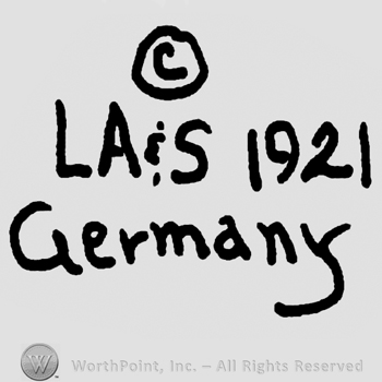 Copyright symbol, capital LA&S, year 1921, Germany written below with lowercase letters