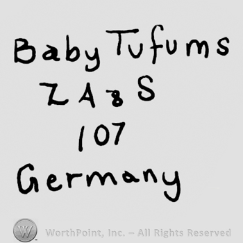 Baby Tufums with lowercase letters, capital LA&S, number 107 and Germany written with lowercase letters