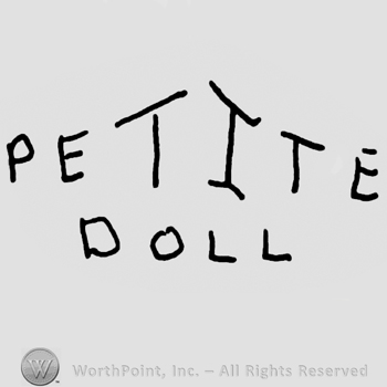 Petite Doll with uppercase irregular-shaped letters