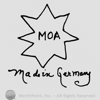 Uppercase MOA inside a star, Made in Germany written below with lowercase letters