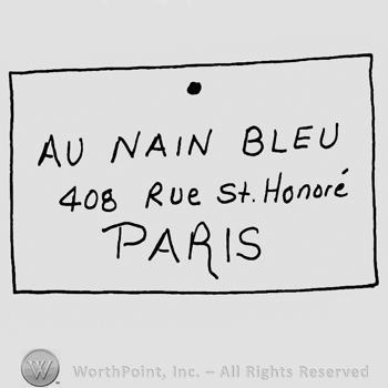 Au Nain Bleu with uppercase letters over 40B Rue St. Honore with lowercase letters, Paris written below with uppercase letters, all inside a rectangle