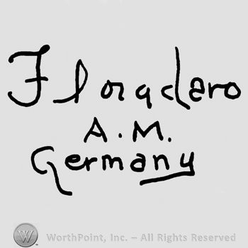 Floradaro handwritten with lowercase letters, uppercase A.M. Germany with lowercase letters