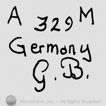 Capital AM, number 329, Germany with lowercase letters, handwritten capital GB