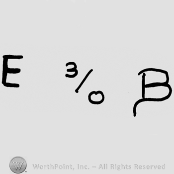 Capital E, number 3 slash 0, capital B