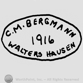 C.M. Bergmann Walters Hausen 1916 written written with uppercase letters inside an oval design