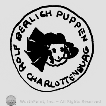 Puppet head, Rolf Belrich Puppen Charlottenburg written around it with uppercase letters, all inside a circle