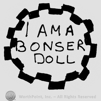 I am a Bonser Doll written with uppercase letters inside a toothed circle