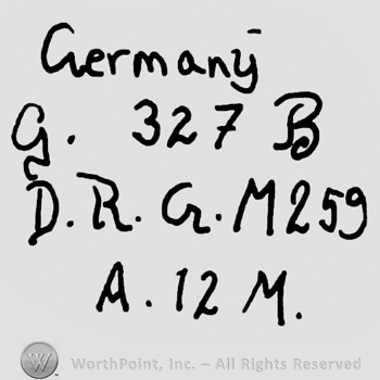 Germany with lowercase letters, capital handwritten G, number 327 and capital handwritten B, capital handwritten D.R.G.M. And number 259, uppercase A, number 12 and uppercase M