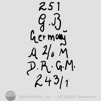 Number 251, uppercase handwritten G.B., Germany written with lowercase letters, uppercase handwritten A and M wih 2/0 in between, uppercase handwritten D.R.G.M. Over number 243/1