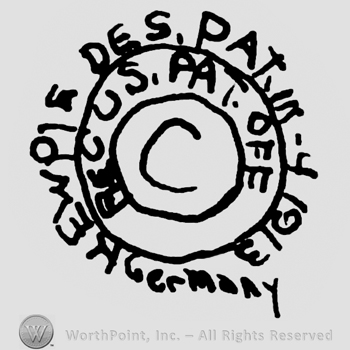 Kewpie Des. Pat. Germany written around a circle with uppercase letters, Upercase C in the centre and Reg. US Pat. Off written with uppercase letters around the C
