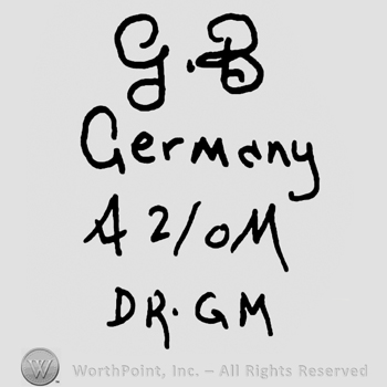 Uppercase handwritten GB over Germany written with lowercase letters, uppercase A and M with 2/0 in between, uppercase D.R.G.M.