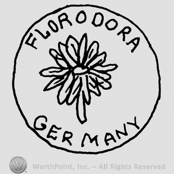Florodora Germany written with uppercase letters around a flower inside a circle