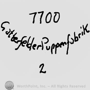 Number 1100 over Catterfelder Puppenfabrik handwritten with calygraphic lowercase letters, number 2 below