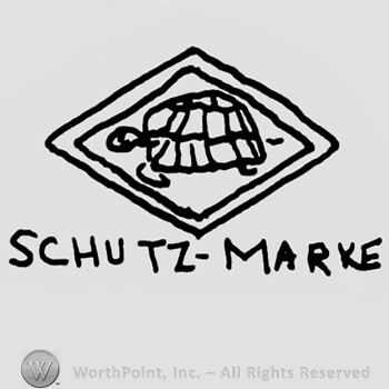 Turtle inside a double-lined diamond, Shutz-Marke written below with uppercase letters