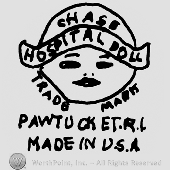 Chase Hospital Doll written with uppercase letters, on a ribbon, stylized baby face, Trade Mark Pawtucket R.L. Made in USA written below with uppercase letters