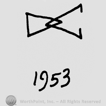 Uppercase stylized DC similar to a bow and year 1953 written below
