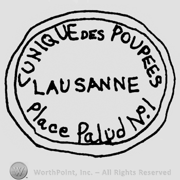 Cunique des Poupees Lausanne written with uppercase letters, Place Palud No. 1 with lowercase letters, all inside a double-lined circle
