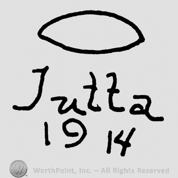 Oval over Jutta handwritten with lowercase letters, year 1914 written below