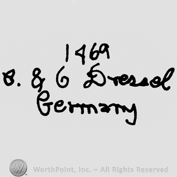 Number 1469 over uppercase B 86 Dressel Germany handwritten with lowercase letters