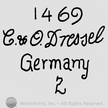 Number 1469 over handwritten lowercase C&O Dressel, Germany with lowercase letters and number 2