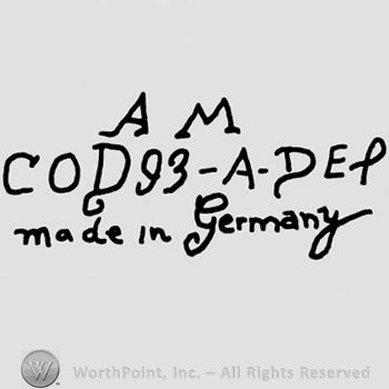 Uppercase AM over COD93-A-DEP written with uppercase letters, Made in Germany handwritten with lowercase letters
