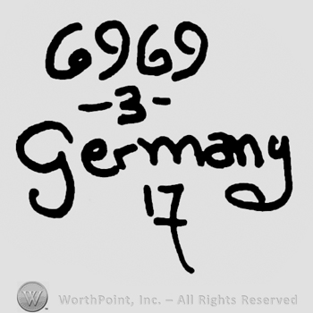 Uppercase G and number 969, number 3 below, Germany with lowercase letters over number 17
