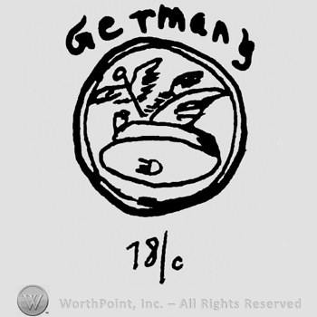 Germany with lowercase letters over viking hat with bird wings and uppercase mirrored E and uppercase D in a circle, 18/0 written below